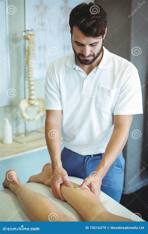 Physiotherapist Giving Leg Massage To A Woman Stock Image Image Of Medical Indoors 74516379