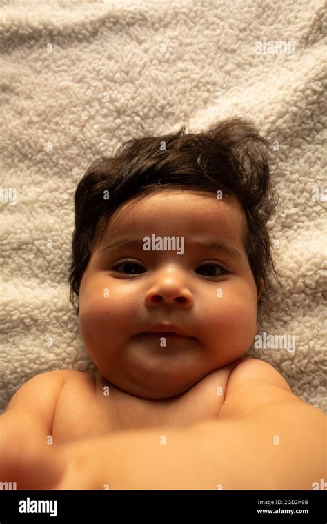 Portrait Of A Hispanic Newborn Baby Smiling And Happy Stock Photo Alamy