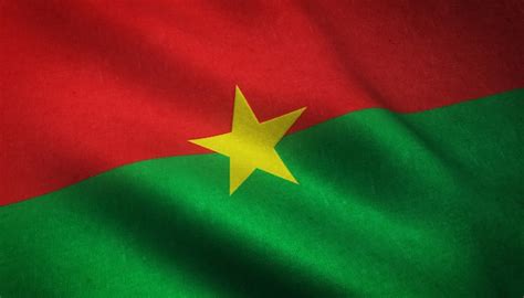 Primer Plano De La Bandera De Burkina Faso Con Texturas Grungy Foto