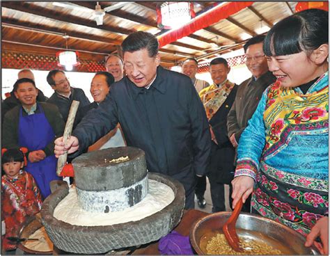 President Xi Jinping Grinds Soy Beans To Make Bean Curd