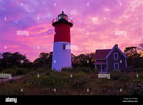 Nauset Lighthouse Purple Sunset In Cape Cod Massachusetts Stock Photo
