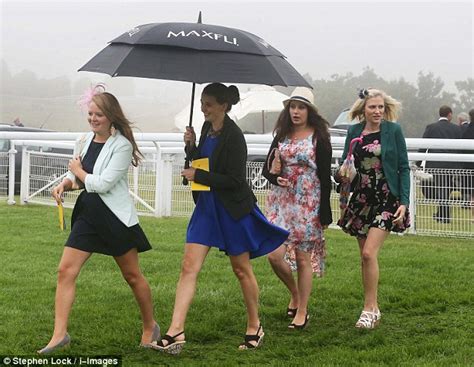 Not So Glorious Goodwood Brollies Go Up As Races Are Hit By Torrential