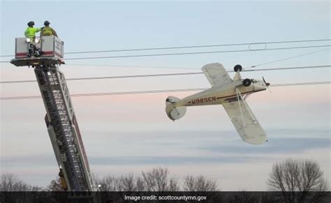 Pilot Rescued After Plane Gets Entangled In High Voltage Power Lines