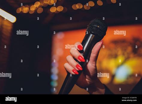 Microphone And Female Singer Close Up Woman Singing Into A Microphone