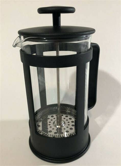 While the water is heating, grind your coffee. Bodum French Press 4 cup 32 oz coffee maker matte black ...