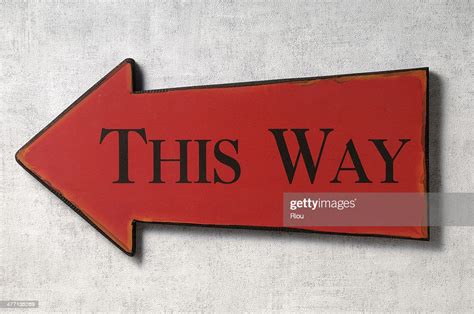 This Way Sign High Res Stock Photo Getty Images