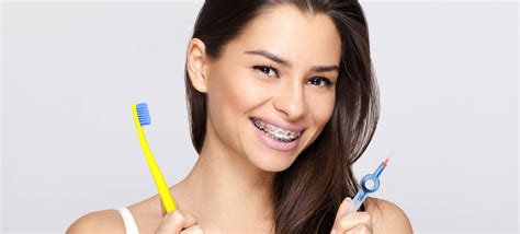 How To Brush Teeth With Braces At Home Brushing And Flossing With