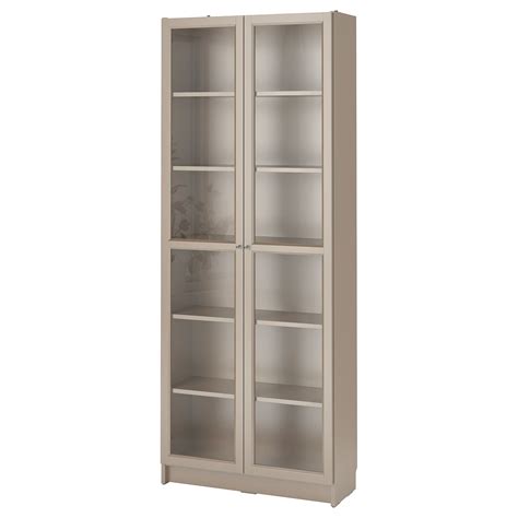 It is estimated that every five seconds one billy bookcase is sold somewhere in the world. BILLY Bookcase with glass doors - gray, metallic effect - IKEA