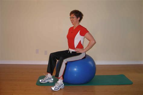 Exercise Ball Seated Leg Raise Hands On Hips