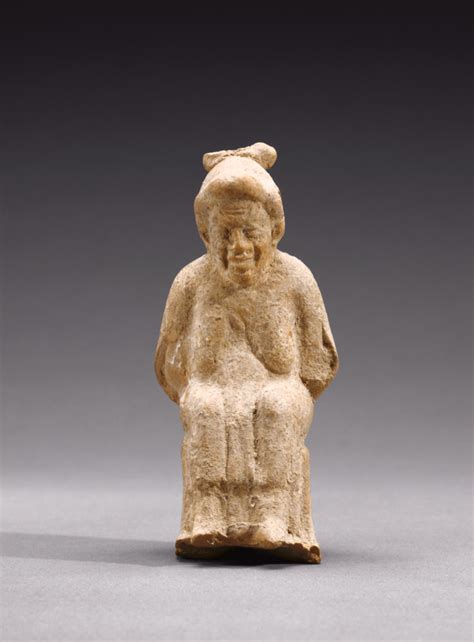 Statuette Of A Seated Old Woman Getty Museum