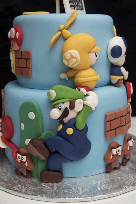 I drew a sketch of super mario including all the pvc connectors such as 45º, 90º, cross i made the head out of a cake dummy, drew mario's face on top and carved the shape of his head. Top 10 Awesome Super Mario Cake Designs - SliControl.Com