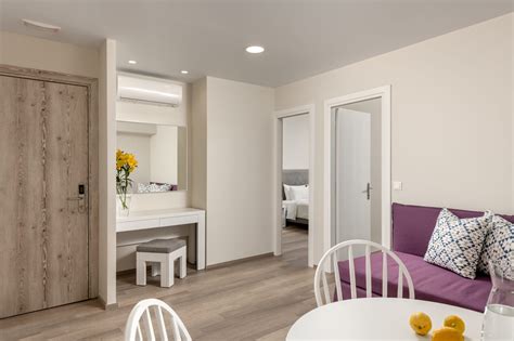 A convertible 2 (aka a conv 2 or flex 2) implies a one bedroom that has been, or can be, changed to a two bedroom. Two-Bedroom Apartment - BIO Suites Hotel in Rethymnon, Crete