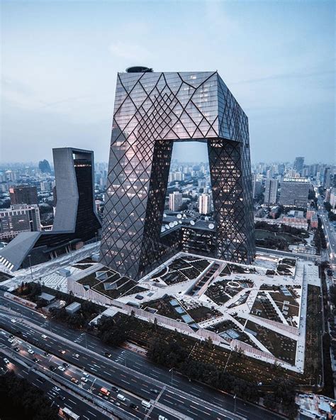 Cctv Headquarters Building Is Designed By Oma And Is Located In Beijing