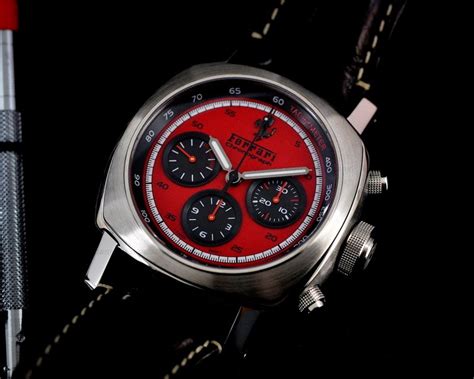 Bright yellow dial with the famous ferrari shield logo and prancing horse at 12 o'clock (also on case back). (20791) Panerai FER00013 Ferrari Granturismo Chronograph SS / Red Dial