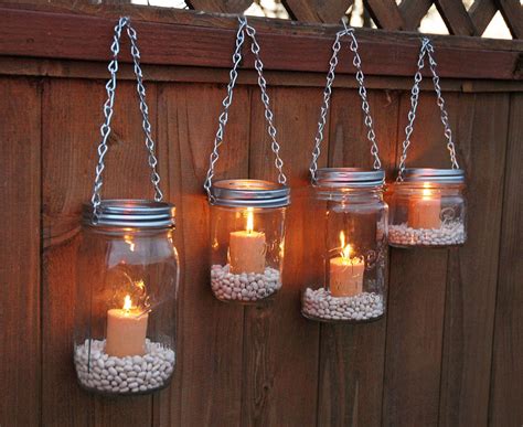 The trick is to be safe when you're drilling the holes. Hanging Mason Jar Garden Lights DIY Lids Set by ...