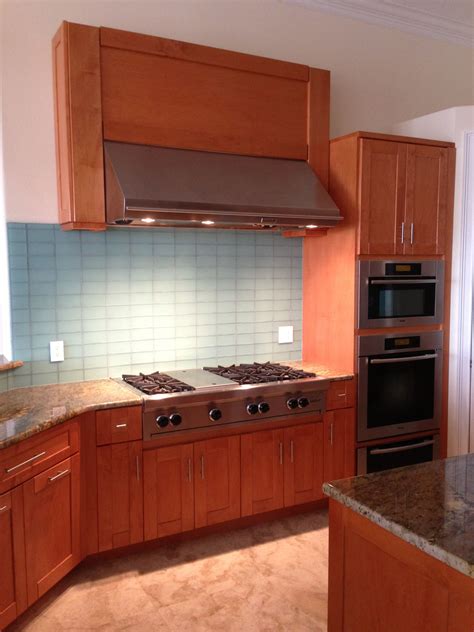 Going gray all things g d. Maple with glass backsplash | Glass backsplash, Kitchen, Kitchen cabinets