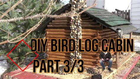 Moose head cutout, front porch bench, black bear cub, light bulb, and entrance ramp. DIY Bird feeder Log Cabin Part 3 - YouTube