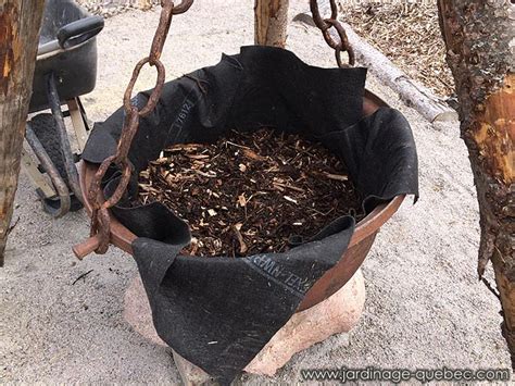This cauldron measures approximately 4 1/4 in diameter. Fill the Cast Iron Cauldron Planter with Potting Mix