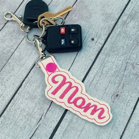 Maybe you would like to learn more about one of these? New to babymoon on Etsy: Mom keyfob - keychain for mom ...