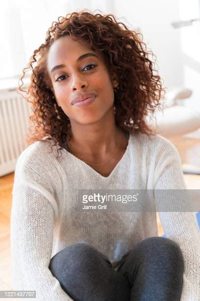Black Woman Hugging Knees Photos Et Images De Collection Getty Images