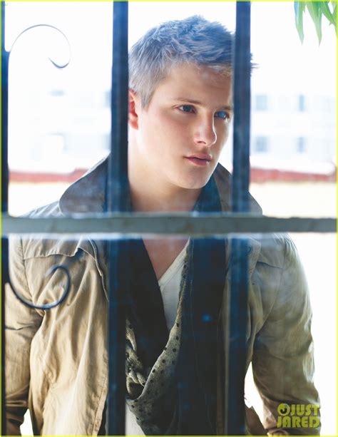 cato from hunger games [he shoots an arrow and misses] katniss everdeen
