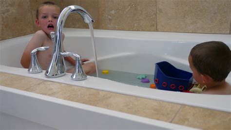 Two Siblings Taking A Warm Bath With Toys Stock Video Footage 0015 Sbv