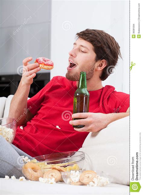 Depressed Young Man Eating Sweets Stock Photo Image Of Beer Leisure