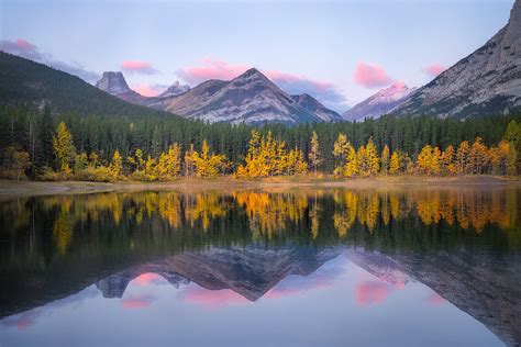 Mirror Lake Fall Colors Reflect On A Still Pond At Sunrise Hilton