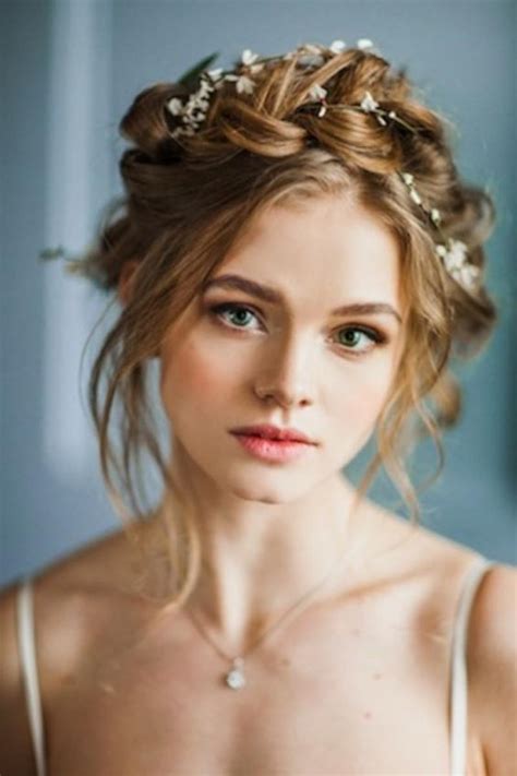10 Flower Crown Hairstyles For Any Bride Bohemian Wedding Hair Romantic Wedding Hair Flower