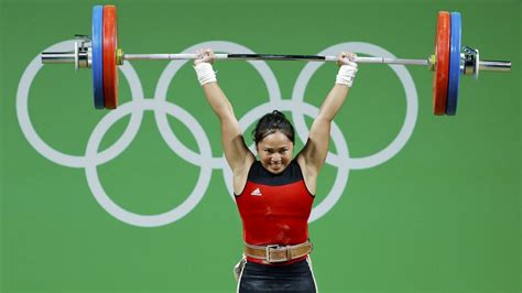 Hidilyn diaz secures her spot in the tokyo 2020 olympics sunday, april 18, at the 2021 asian weightlifting championships. How Philippines' Hidilyn Diaz lifted her way to Olympic ...