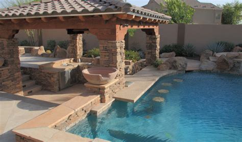 All you need to take care of is getting the seating and counter height right to give enough knee space to people. Swim Up Bars, Swimming Pool Bars | Phoenix Landscaping ...
