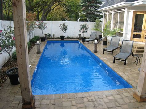 This one is a patio with natural concrete flooring which has a long rectangular swimming pool. backyard pool rectangle - Google Search | Backyard pool ...