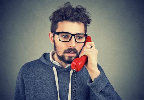 Worried Man Receiving Bad News On Phone Stock Photo Image Of Distress