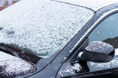 Premium Photo Snow Covered Car Window