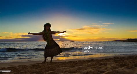 Portrait Of Hawaiian Hula Dancer On The Beach At Sunset High Res Stock