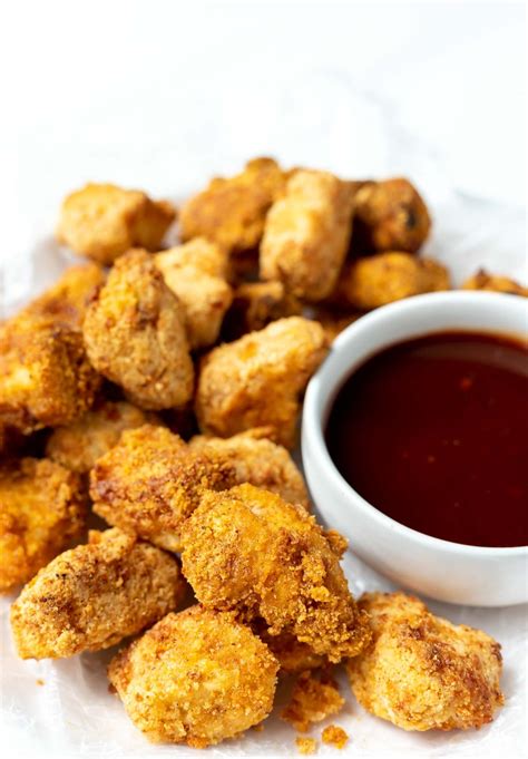 A lot better than any frozen or fast food chicken nuggets. Air Fryer Chicken Nuggets Recipe - WonkyWonderful