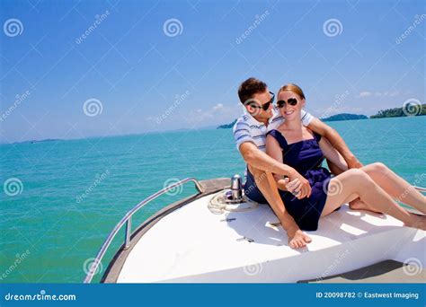 Couple Relaxing On A Boat Stock Photo Image Of Water 20098782
