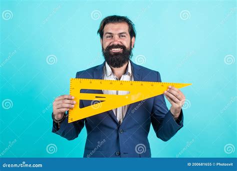 Teacher Man With Happy Face Holding Triangle Ruler Back To School
