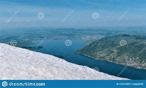 Beautiful Spring Panoramic View Of Snow Capped Mountains In The Swiss