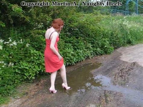 melanie s pink dress and wet high heels mel gets her feet wet with a little puddle splashing