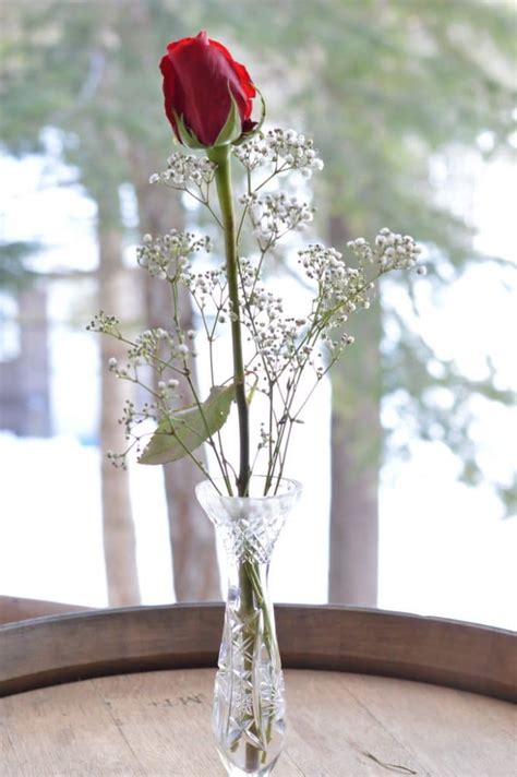 Add a hint of beauty to your wedding with single stem flowers. Create 4 DIY Floral Arrangements From a Single Rose Bouquet