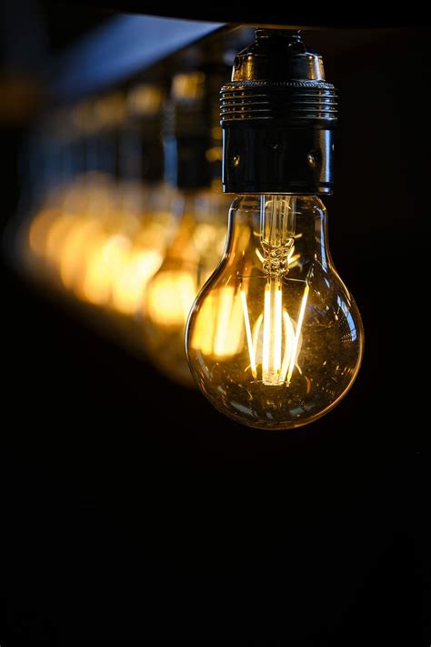 Hd Wallpaper Selective Focus Photography Of Turned On Light Bulb Lamp