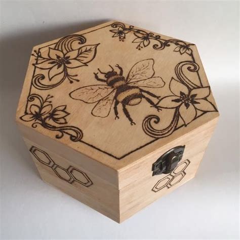 Puzzle boxes, inlaid wood, scroll saw, marquetry and laser cut are just a few of the styles you'll find in every shape and size. Bee and Flower Design Jewellery Box Pyrography ...