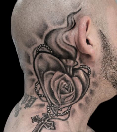 Well, if you liked this tattoo, then you might also want to look at our best rose tattoos. 49 Impressive Religious Neck Tattoos