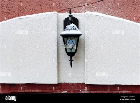 Close Up Vintage Street Light In Shape Of Lantern Hanging On Building