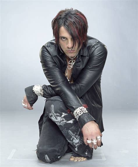 Criss rips bodies apart (on spike). Magician Criss Angel conjures 'Mindfreak Unplugged ...