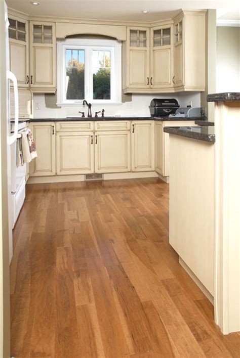 Dark floors contrast nicely with white or cream cabinets, and medium or light tones offer a subtler. Maple Honey/Antique | Wood floors wide plank, Rustic wood floors, Off white kitchen cabinets