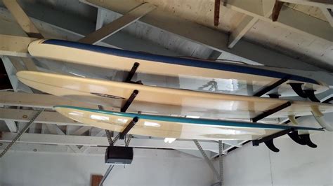 The surfboard ceiling rack is a great space saver for your home, garage, or office. Surfboard Ceiling Rack | Surf Rack | SUP Ceiling Rack | T ...
