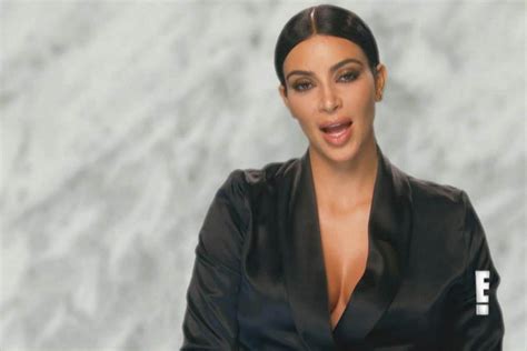 kim kardashian strips down naked for a photoshoot in a brnad new clip for the upcoming season 10
