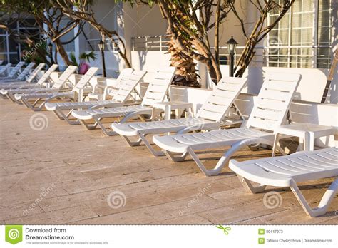 We found 27 results for beach chair rental in or near destin, fl. Beach Chairs Near Swimming Pool Stock Image - Image of outdoor, ocean: 90447973